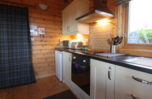 Tain Cabin | The lodge offers stunning views West to Ben Wyvis and North to the hills and mountains of East Suthe