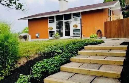 Eden House | The Orange House with heated pool, Sleeps 8