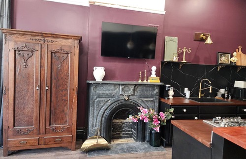 Akron Apartment | The Plum Parlor - Moody Victorian Studio with Timeless Charm