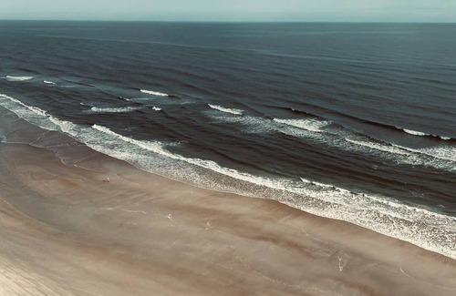 Daytona Beach Shores Condo | The pool is open! Come have your best vacation ever!