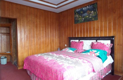 Tengger Caldera Bed & Breakfast | The rooms on the cliff overlooking Mt. Bromo