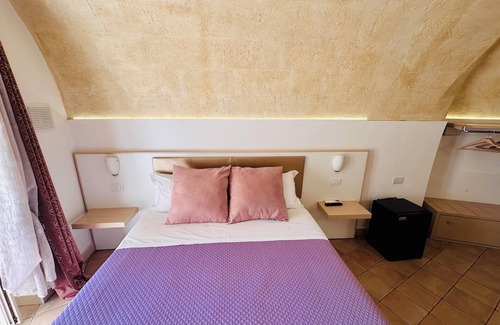Matera Hotel | The Smile of the Sassi Rooms. Idris Superior Deluxe on Sassi view.