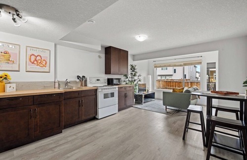Okotoks Apartment | The Sunflower PrivateEntry PetsOK Patio TV