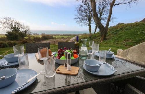 Osmington Cottage | THE TRANSMITTER BUNKER, pet friendly, with open fire in Ringstead