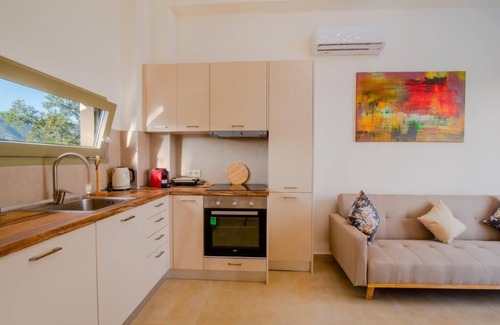 Doukades Villa | The villa's large private garden leads directly to the outdoor private pool.