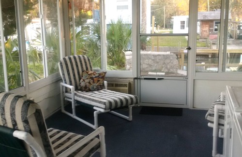 South Waterfront Park House | The Waters Edge 2/1 with Boat Dock in back yard