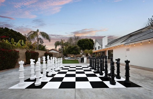 Thayer Estates House | The Wildflower · The Wildflower - Waterslide, Theater, B-ball