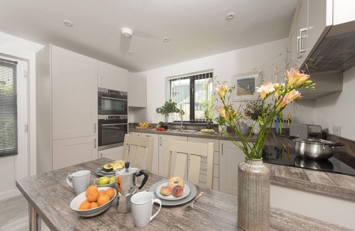 Perranporth Cottage | The Wood Shed, a charming one-bedroom holiday home, sits nestled on the outskirts of Perranporth, a