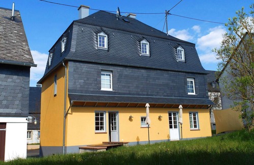 Irmenach House | The yellow vacation home