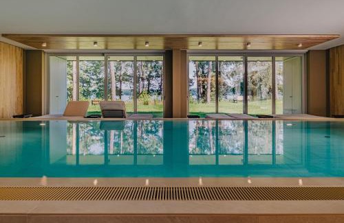 Bad Saarow Apartment | TheChipp - Designapartment mit Seeblick, Pool, Sauna & Kamin