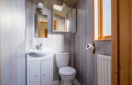 Knott End-on-Sea Cabin | This beautiful traditional lodge situated within a woodland setting is the perfect location for you