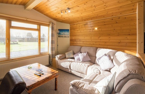 Knott End-on-Sea Cabin | This beautiful traditional lodge situated within a woodland setting is the perfect location for you