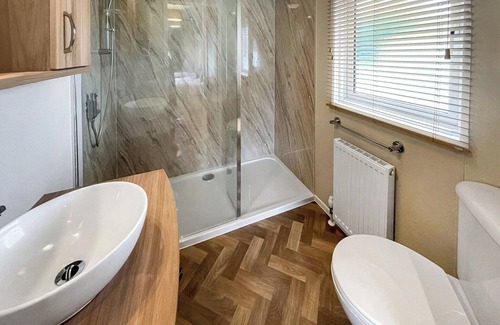 Langham House | This exclusive holiday home boasts a stylish and contemporary design.