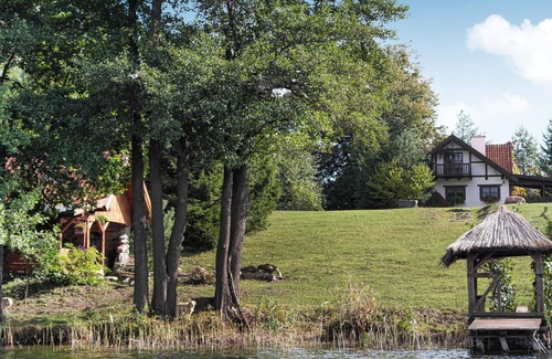 Milakowo House | This large cottage is located on an enclosed natural plot on the water (Noter Duzy lake) in Janowo.