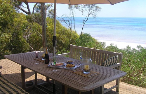 Emu Bay House | This luxury beachfront home shares the sand dune with Little Penguins