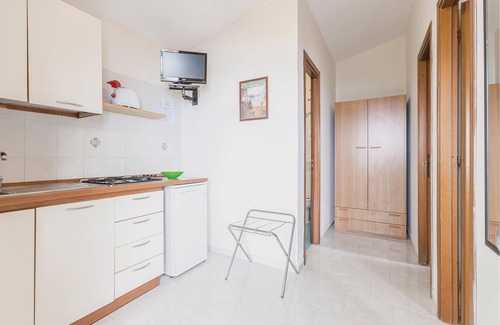 Monte Chiaro Apartment | This modern bungalow belongs to a vacation home complex directly above the sea, with a unique panora