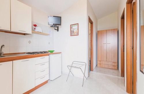 Monte Chiaro Apartment | This modern bungalow belongs to a vacation home complex directly above the sea, with a unique panora