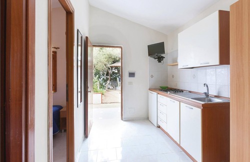 Monte Chiaro Apartment | This modern bungalow belongs to a vacation home complex directly above the sea, with a unique panora