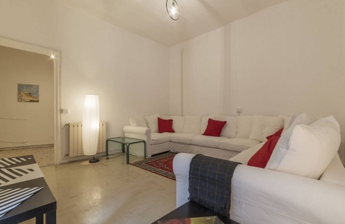 Salario Apartment | This spacious 180sqm apartment with four bedrooms is able to accommodate up to 8 people. Located on the first floor (with elevator) of a restored period building, the apartment overlooks the private park of Villa Albani, one of the most beautiful and pea
