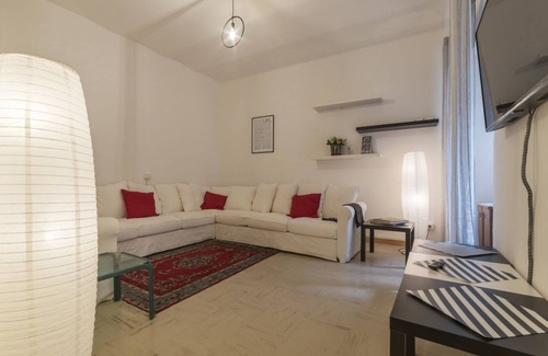 Salario Apartment | This spacious 180sqm apartment with four bedrooms is able to accommodate up to 8 people. Located on the first floor (with elevator) of a restored period building, the apartment overlooks the private park of Villa Albani, one of the most beautiful and pea