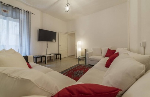 Salario Apartment | This spacious 180sqm apartment with four bedrooms is able to accommodate up to 8 people. Located on the first floor (with elevator) of a restored period building, the apartment overlooks the private park of Villa Albani, one of the most beautiful and pea