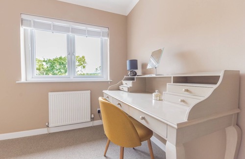 Cark Cottage | This warm and welcoming cottage, with a homely feel, has a balcony where you can watch ducks go by.