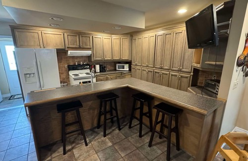 Bridgeview Apartment | Three Bedroom Three Bath Penthouse with Sauna & Exercise/Office Space