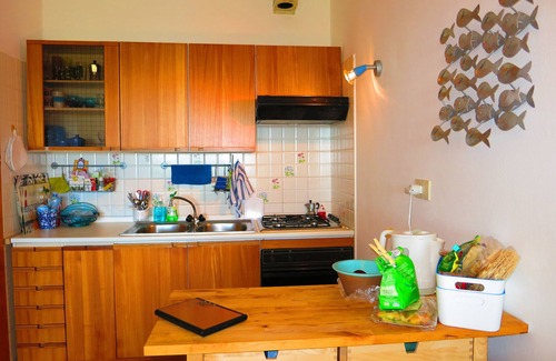 San Teodoro Apartment | Three-room garden apartment with sea view, 200m from Salina Bamba and 800m from Cala Brandinchi