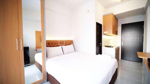 Sidoarjo Apartment | Tidy and Cozy Stay Studio Apartment at Suncity Residence By Travelio
