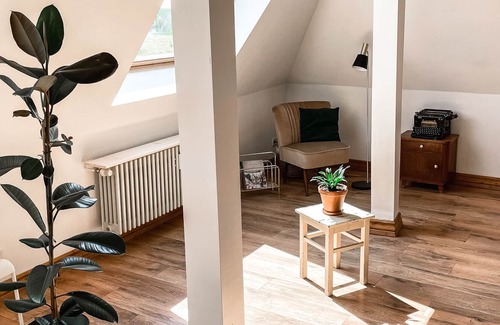 Bornicke House | Time out in a beautiful old train station on the edge of the forest in a large loft