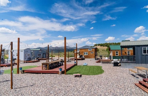Meeker House | Tiny home with one queen bed and fold out couch all on main floor. Sleeps: 3