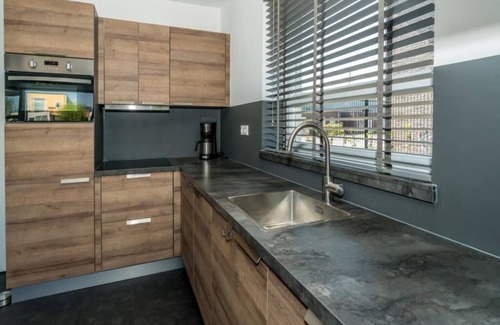 Oude-Tonge House | Tough and industrial with lots of space around the house for storing your fishing or cycling equipme
