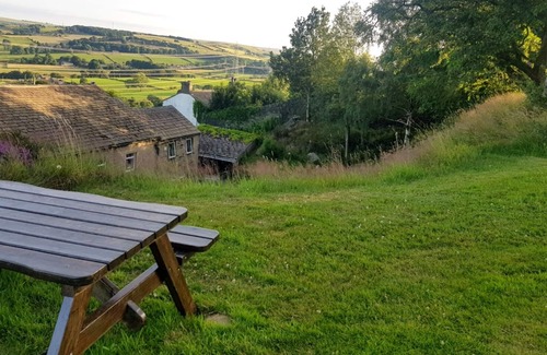 Barkisland Cottage | Traditional stone cottage in Barkisland. Superb views. Pet friendly. Four Stars.