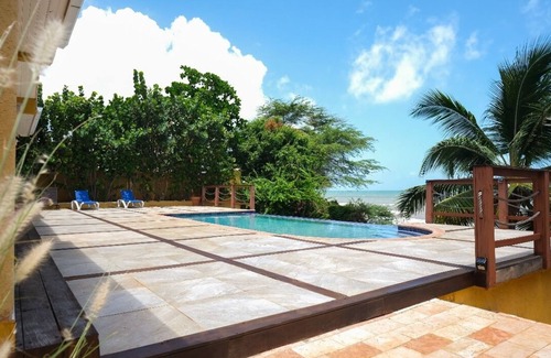Alligator Pond House | Tranquil 3-bedroom villa on beachfront lot with Pool, Gazebo and Private Beach