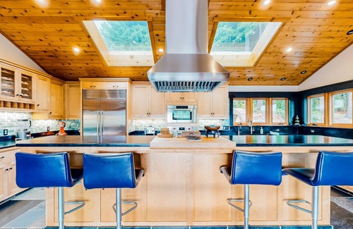 McKinleyville House | Tranquil and luxe river stay with wraparound deck, hot tub, sauna, & mtn views