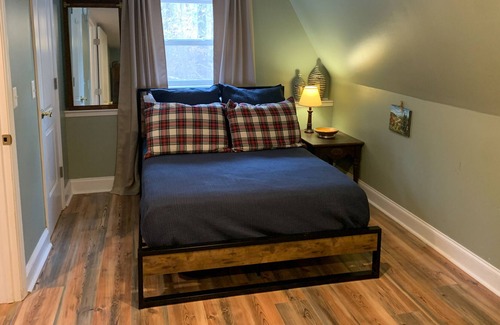 Flintstone House | Tranquil chalet with private hot tub, washer/dryer & central AC - near downtown