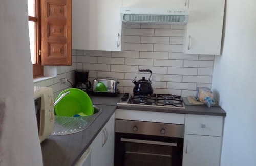 Los Alias Cottage | Tranquil Cottage With Shared Pool, Set In Pretty Mediterranean garden.