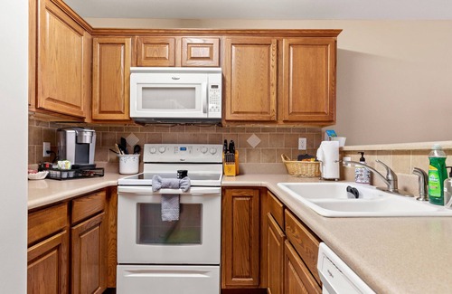 New Braunfels Condo | Tranquil Cozy Riverfront Condo | Guadalupe River Access | Pools & Hot Tubs | Walk to Schlitterbahn