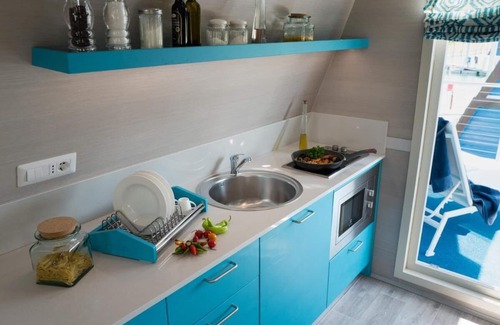 Lignano Sabbiadoro Boat Rental | Tranquil Marina Azzurra Resort House boat 2 Bedroom sleeps 6