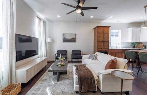 Brookline Station House | Tranquil Townhome-Your Nature Retreat Next to Nature, River & Golf!