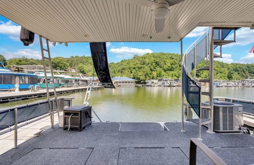 Smithville Boat Rental | Tranquil Waterside Escape: Premier Houseboat Rental on Center Hill Lake