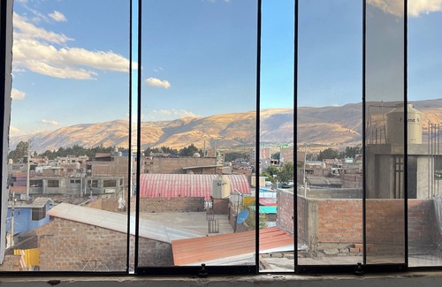 Chupaca Apartment | Travel's house in Cupaca has a shared living room and kitchen. For all V