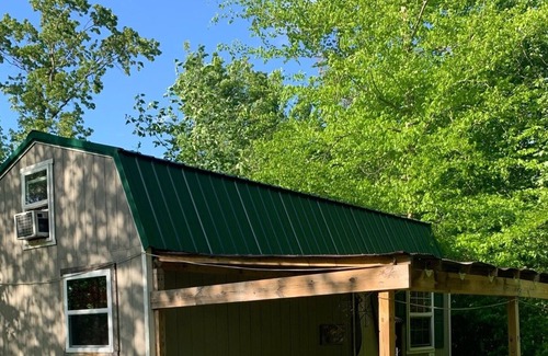 Jonesborough Cabin | Tree house themed tiny house in a tiny house community mountain retreat.