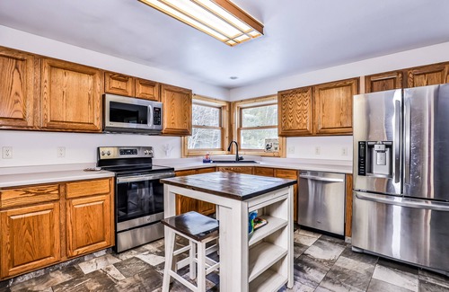 Mercer House | Tree-lined home with gas grill, firepit, & fireplace - walk to lake