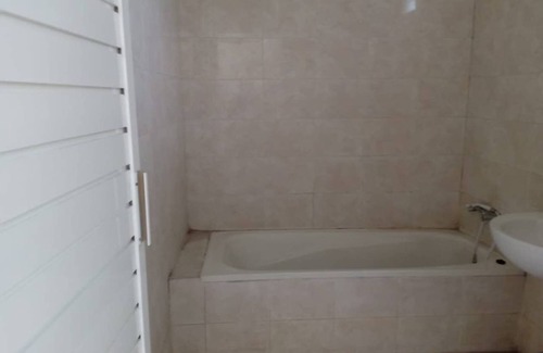 Sidomulyo House | Triple Room with AC at Mutiara Batu