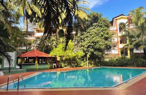 Arpora Apartment | Tropical Charm by Boho- Forest View>Pool & Kitchen