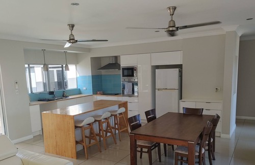 Trinity Park House | Tropical home with in-ground swimming pool -15 min walk to beach