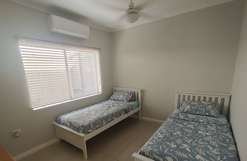 Trinity Park House | Tropical home with in-ground swimming pool -15 min walk to beach