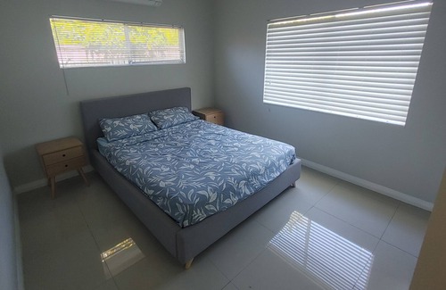 Trinity Park House | Tropical home with in-ground swimming pool -15 min walk to beach