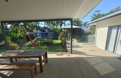 Trinity Park House | Tropical home with in-ground swimming pool -15 min walk to beach